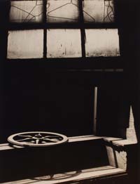 Untitled (hangers in window and wheel), ca. 1950